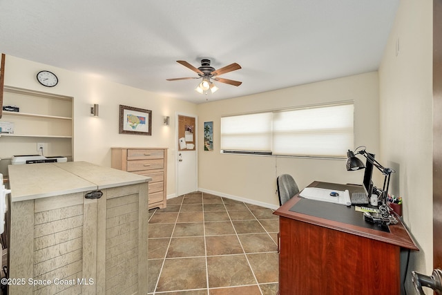 63 Yacht Haven Dr, Cocoa Beach, FL 32931 - office area featuring a ceiling fan and baseboards