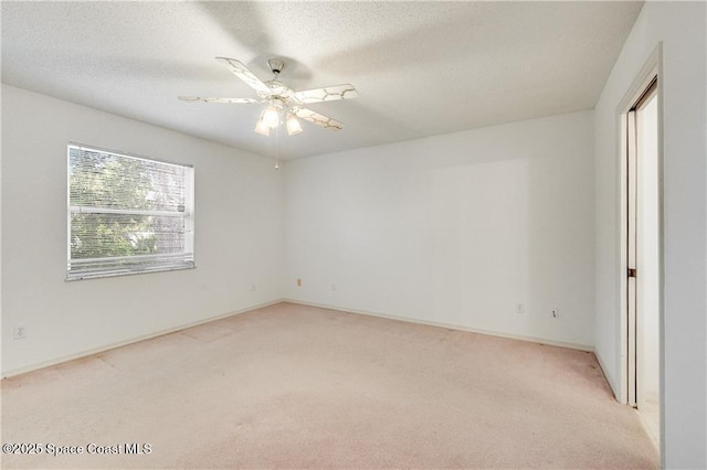 1020 Seamist Ln, Sebastian, FL 32958 - spare room with light colored carpet and a ceiling fan