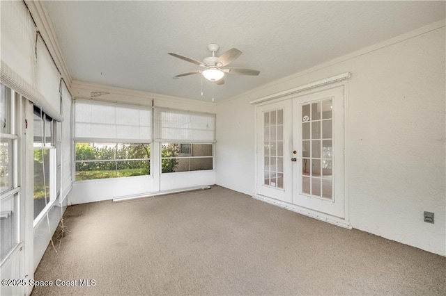 1020 Seamist Ln, Sebastian, FL 32958 - unfurnished sunroom featuring french doors and baseboard heating