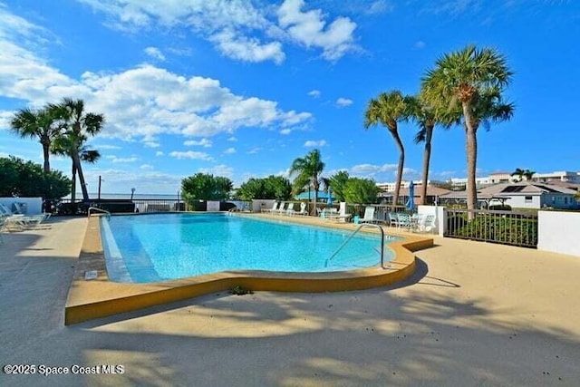 300 Columbia Dr Unit 206-1, Cape Canaveral, FL 32920 - community pool featuring a patio
