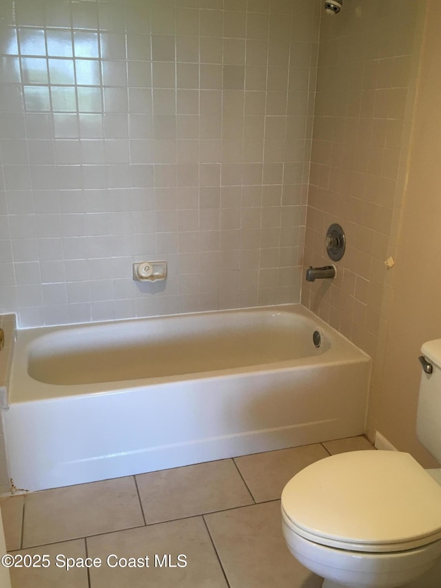 300 Columbia Dr Unit 206-1, Cape Canaveral, FL 32920 - bathroom with tile patterned floors and shower / bathtub combination