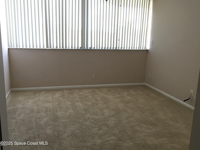 300 Columbia Dr Unit 206-1, Cape Canaveral, FL 32920 - spare room with carpet flooring