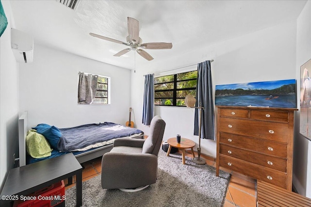 2314 Post Rd, Melbourne, FL 32935 - bedroom featuring an AC wall unit and ceiling fan
