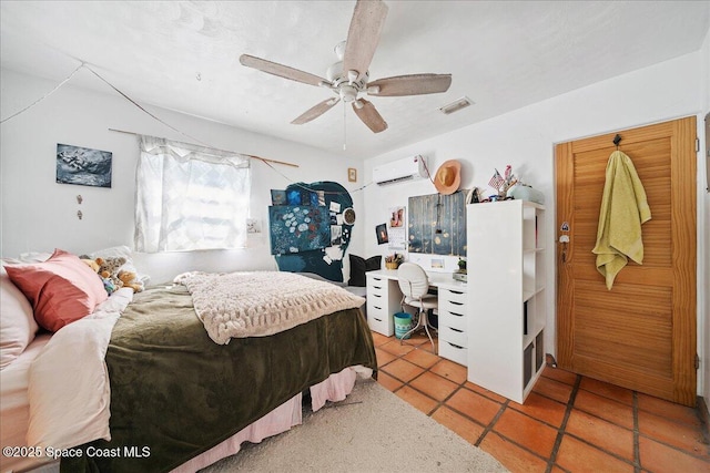 2314 Post Rd, Melbourne, FL 32935 - bedroom featuring an AC wall unit, tile patterned floors, and ceiling fan
