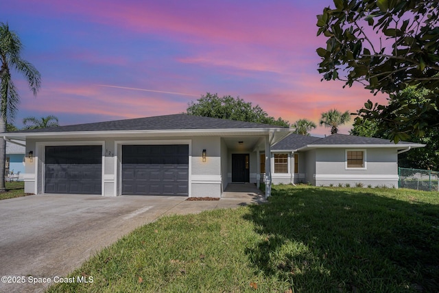 127 Friar Ct, Sebastian, FL 32958 - single story home featuring an attached garage, concrete driveway, and stucco siding