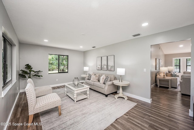 127 Friar Ct, Sebastian, FL 32958 - living room with dark wood-type flooring, healthy amount of natural light, and recessed lighting