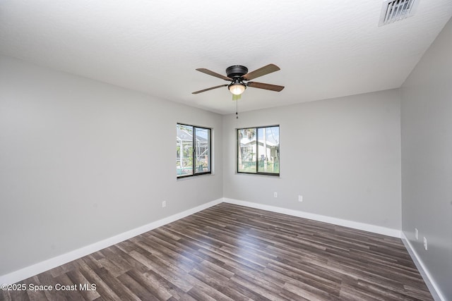 127 Friar Ct, Sebastian, FL 32958 - spare room with dark wood finished floors and a ceiling fan