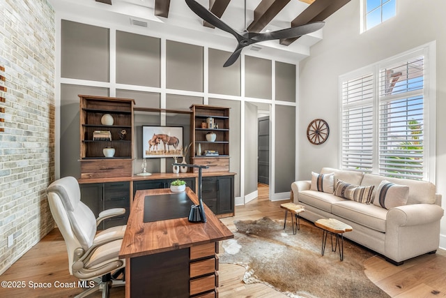 3778 Lake Adelaide Pl, Rockledge, FL 32955 - office with a high ceiling, ceiling fan, light wood finished floors, and brick wall