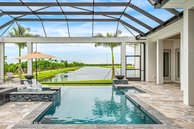 3778 Lake Adelaide Pl, Rockledge, FL 32955 - swimming pool featuring an outdoor hot tub, a water view, a patio area, and a lanai