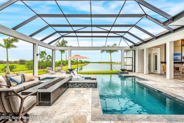 3778 Lake Adelaide Pl, Rockledge, FL 32955 - view of pool featuring a patio, an outdoor living space with a fire pit, a water view, and glass enclosure