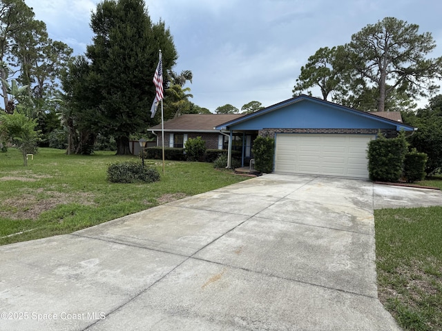 3145 1st Ln, Vero Beach, FL 32968 - ranch-style house with concrete driveway, a garage, and a front yard