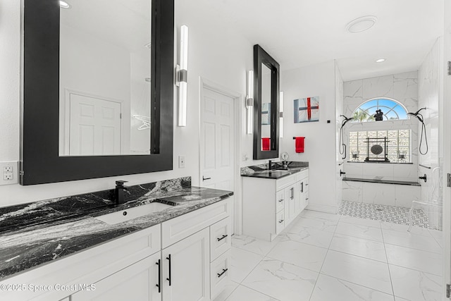 227 Loggerhead Dr, Melbourne Beach, FL 32951 - full bath featuring marble finish floors, a marble finish shower, two vanities, and recessed lighting