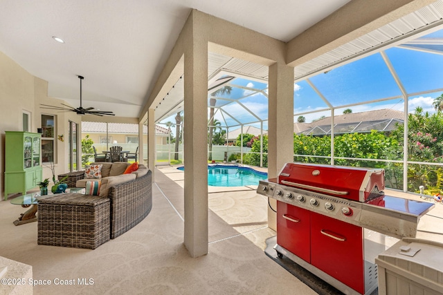 227 Loggerhead Dr, Melbourne Beach, FL 32951 - view of patio / terrace with an outdoor pool, glass enclosure, a ceiling fan, and grilling area