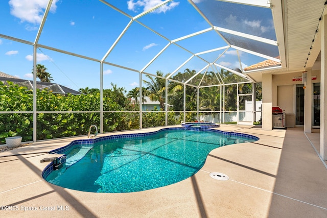 227 Loggerhead Dr, Melbourne Beach, FL 32951 - view of swimming pool featuring a patio area, a pool with connected hot tub, and glass enclosure
