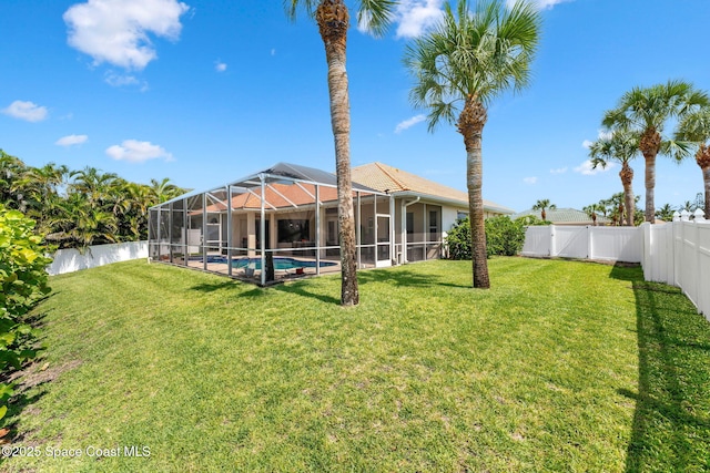 227 Loggerhead Dr, Melbourne Beach, FL 32951 - fenced backyard featuring glass enclosure