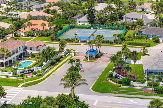 227 Loggerhead Dr, Melbourne Beach, FL 32951 - aerial perspective of suburban area with a pool