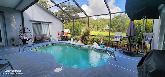688 Naples Ct, West Melbourne, FL 32904 - swimming pool with a patio area and glass enclosure