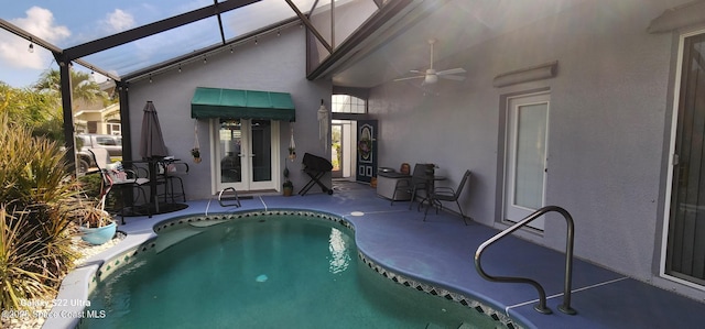 688 Naples Ct, West Melbourne, FL 32904 - outdoor pool featuring ceiling fan, a patio area, glass enclosure, and french doors