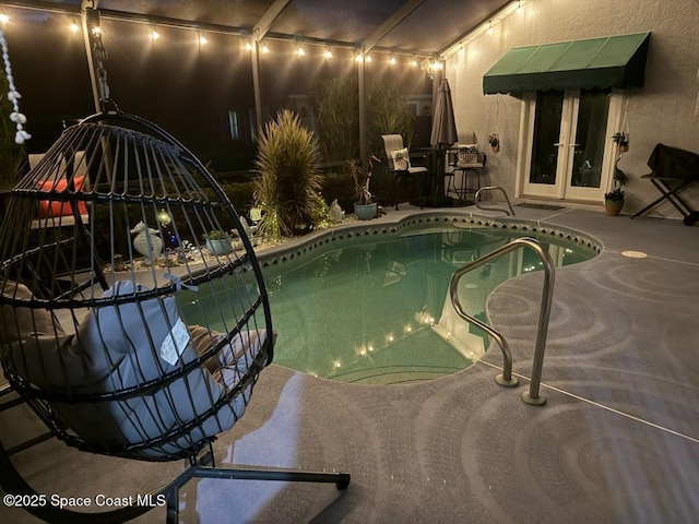 688 Naples Ct, West Melbourne, FL 32904 - outdoor pool featuring a patio and french doors