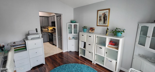 688 Naples Ct, West Melbourne, FL 32904 - office featuring lofted ceiling and wood finished floors