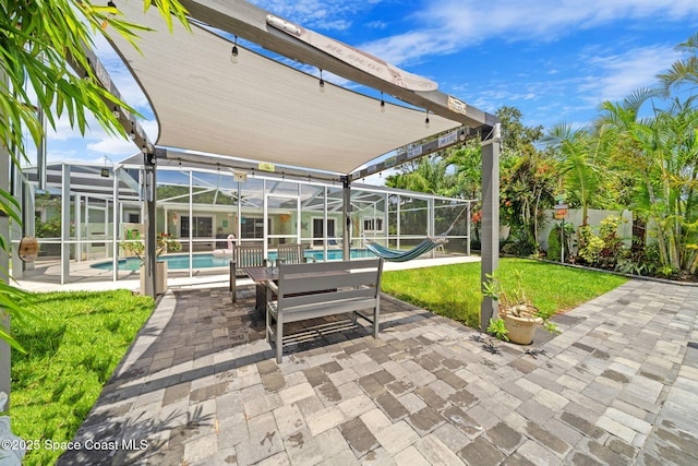1732 Bay Shore Dr, Cocoa Beach, FL 32931 - view of patio / terrace featuring an outdoor pool and glass enclosure