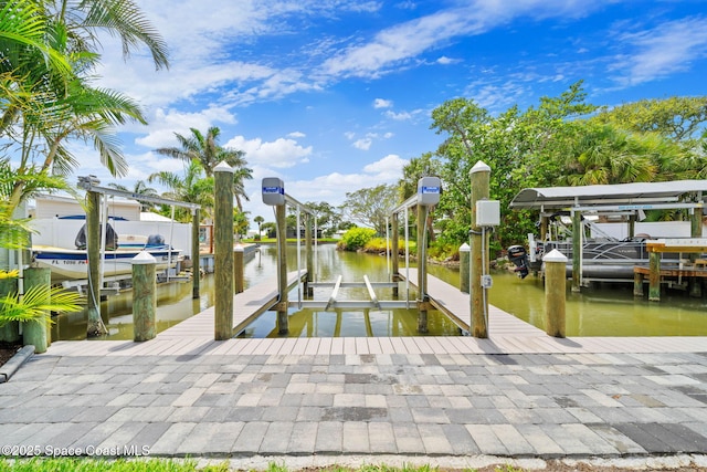 1732 Bay Shore Dr, Cocoa Beach, FL 32931 - dock area with boat lift and a water view