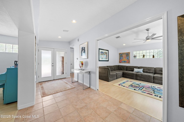 1732 Bay Shore Dr, Cocoa Beach, FL 32931 - foyer featuring french doors, a ceiling fan, and recessed lighting