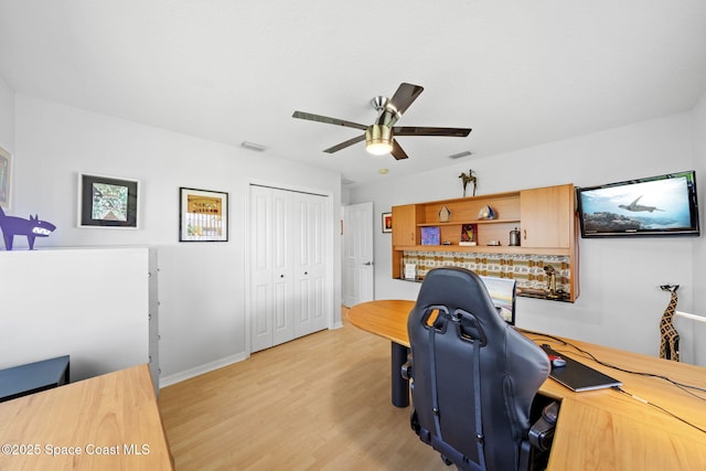 1732 Bay Shore Dr, Cocoa Beach, FL 32931 - office space featuring ceiling fan and light wood-style floors