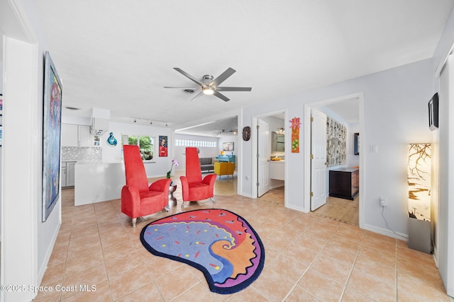 1732 Bay Shore Dr, Cocoa Beach, FL 32931 - recreation room featuring ceiling fan and light tile patterned floors