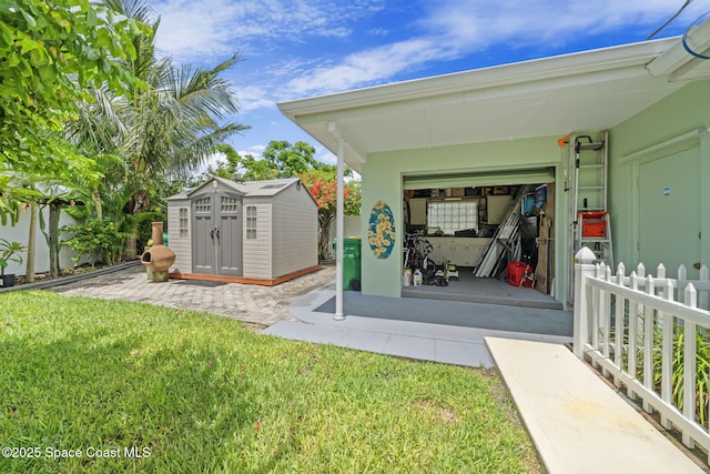 1732 Bay Shore Dr, Cocoa Beach, FL 32931 - view of green lawn with a shed