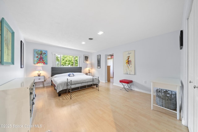 1732 Bay Shore Dr, Cocoa Beach, FL 32931 - bedroom featuring light wood-style floors and recessed lighting
