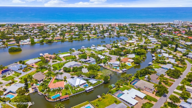 1732 Bay Shore Dr, Cocoa Beach, FL 32931 - aerial view of property's location with a nearby body of water and nearby suburban area