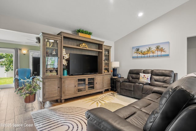 212 Olivick Cir NE, Palm Bay, FL 32907 - living room featuring lofted ceiling, recessed lighting, and a ceiling fan