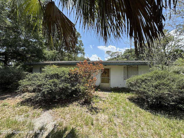 3105 Hield Rd, Melbourne, FL 32904 - view of front of home with stucco siding