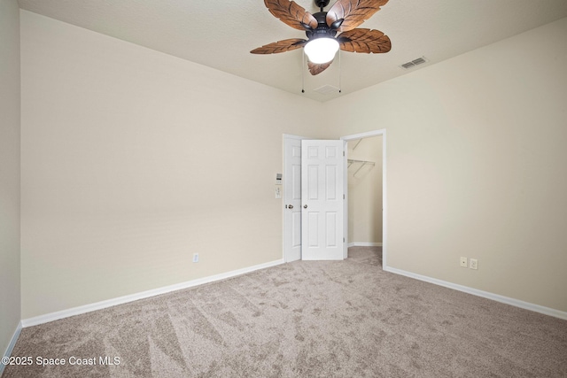 2690 Cypress Tree Trl, Saint Cloud, FL 34772 - carpeted spare room featuring ceiling fan and baseboards
