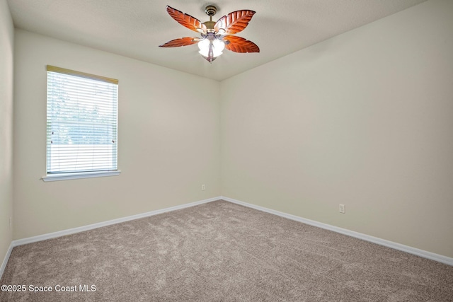 2690 Cypress Tree Trl, Saint Cloud, FL 34772 - empty room featuring a ceiling fan and carpet floors
