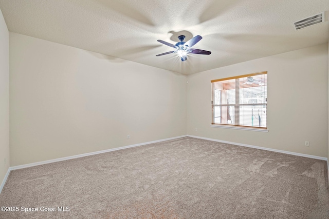 2690 Cypress Tree Trl, Saint Cloud, FL 34772 - unfurnished room with carpet floors, ceiling fan, and a textured ceiling