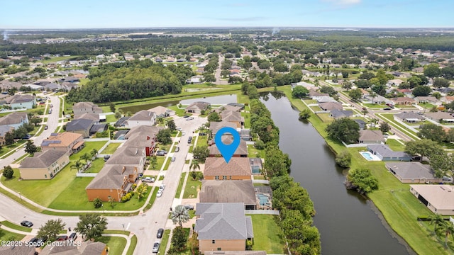 2690 Cypress Tree Trl, Saint Cloud, FL 34772 - aerial view of property's location with a nearby body of water and nearby suburban area