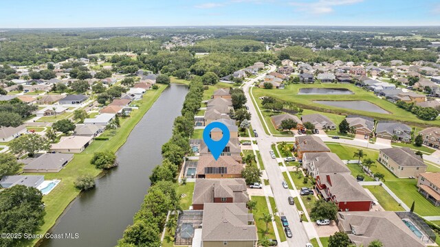 2690 Cypress Tree Trl, Saint Cloud, FL 34772 - aerial view of property and surrounding area featuring nearby suburban area and a nearby body of water