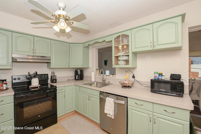 858 Bianca Dr NE, Palm Bay, FL 32905 - kitchen featuring black appliances, under cabinet range hood, green cabinets, light countertops, and a ceiling fan