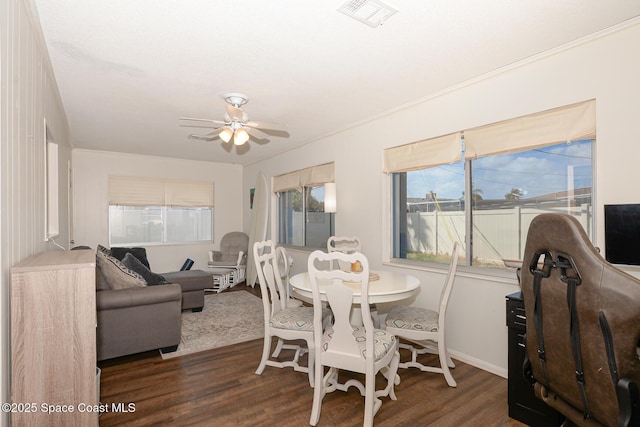 858 Bianca Dr NE, Palm Bay, FL 32905 - dining room featuring dark wood-style flooring and ceiling fan