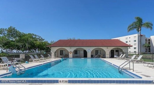5805 N Banana River Blvd Unit 1117, Cape Canaveral, FL 32920 - community pool featuring a patio area