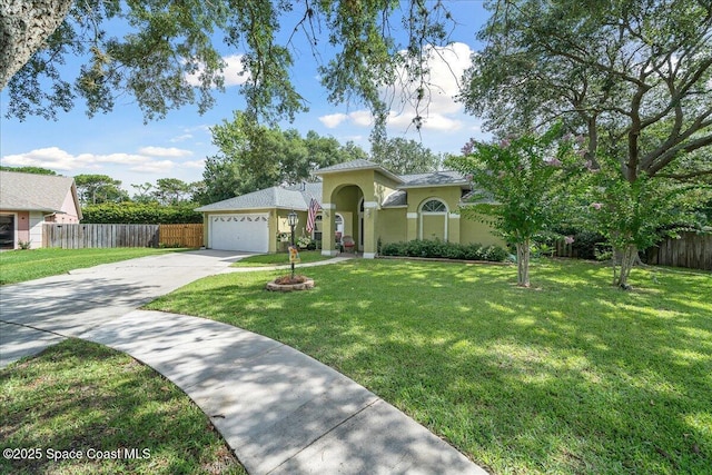 3635 Manassas Ave, Melbourne, FL 32934 - mediterranean / spanish-style home with driveway, a garage, and stucco siding