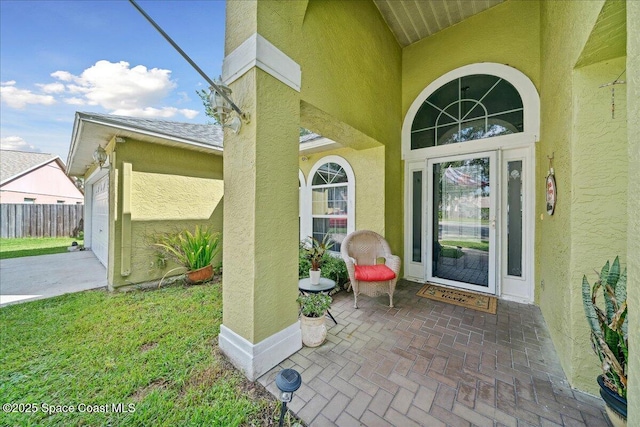 3635 Manassas Ave, Melbourne, FL 32934 - entrance to property with stucco siding and a garage