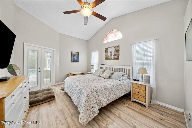 3635 Manassas Ave, Melbourne, FL 32934 - bedroom with access to outside, french doors, multiple windows, light wood-style flooring, and high vaulted ceiling
