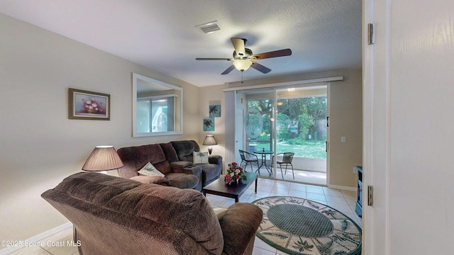 1347 Hampton Park Ln, Melbourne, FL 32940 - living room with light tile patterned floors and a ceiling fan