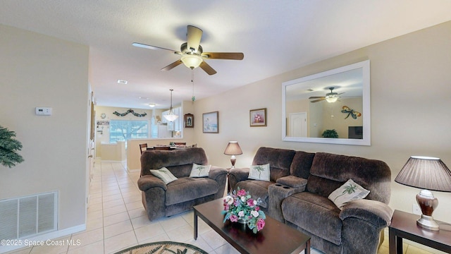 1347 Hampton Park Ln, Melbourne, FL 32940 - living area with a ceiling fan and light tile patterned flooring