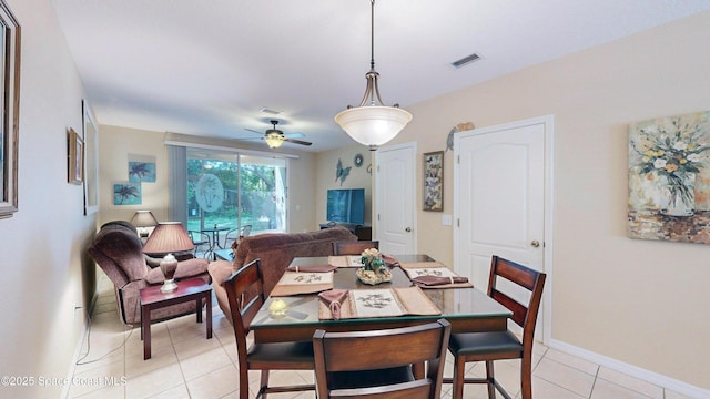 1347 Hampton Park Ln, Melbourne, FL 32940 - dining area with light tile patterned floors and a ceiling fan