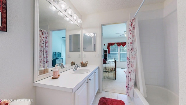 1347 Hampton Park Ln, Melbourne, FL 32940 - full bath with vanity, tile patterned floors, shower / bath combination with curtain, ceiling fan, and a textured wall