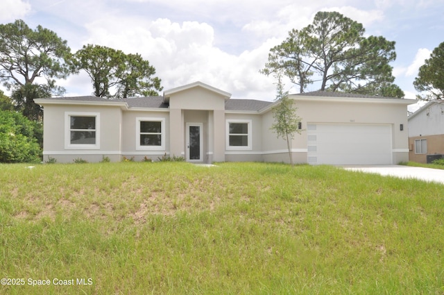 1043 Walden Blvd SE, Palm Bay, FL 32909 - view of front of home with stucco siding, an attached garage, a front yard, driveway, and a shingled roof